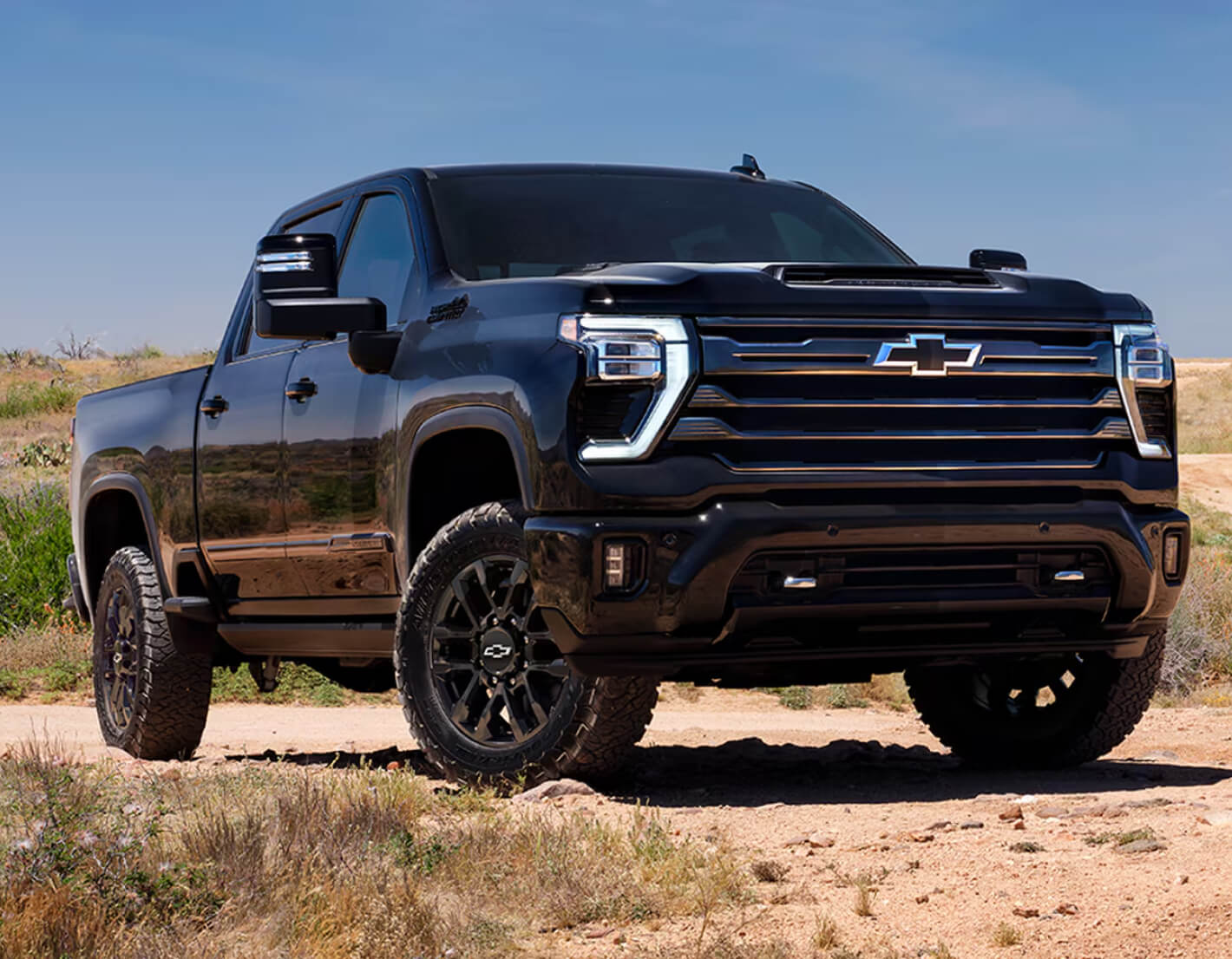 Front View of the 2026 Chevy Silverado HD Parked in the Desert.