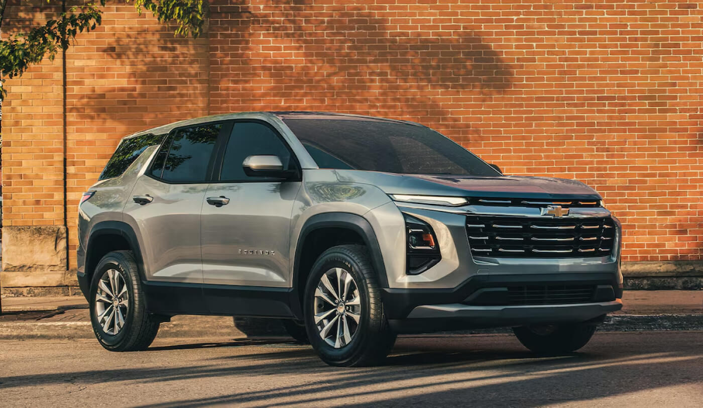 2026 Chevy Equinox EV Parked Near a Brick Building