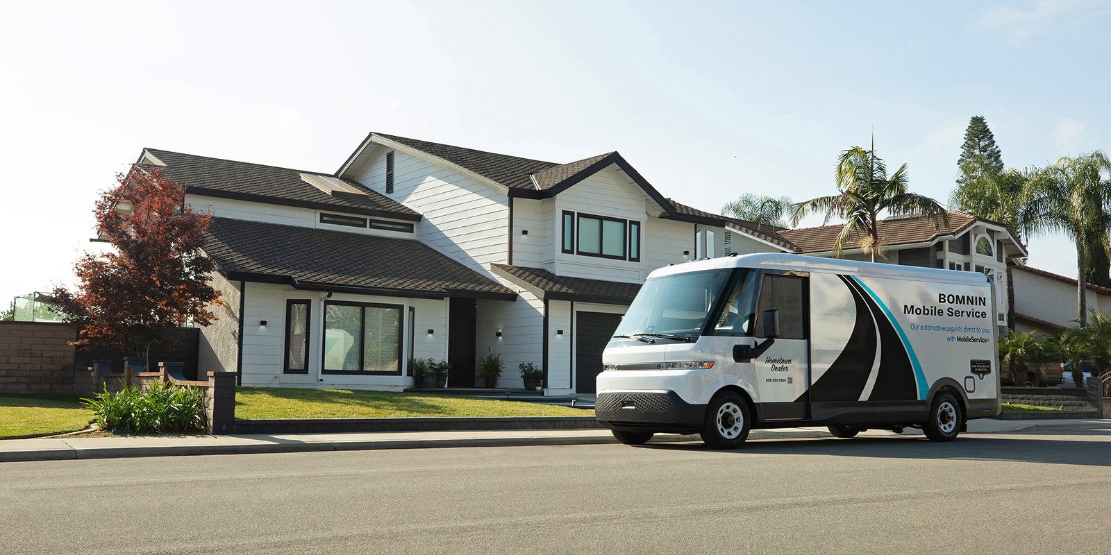 Bomnin Chevy Mobile Service van outside a house